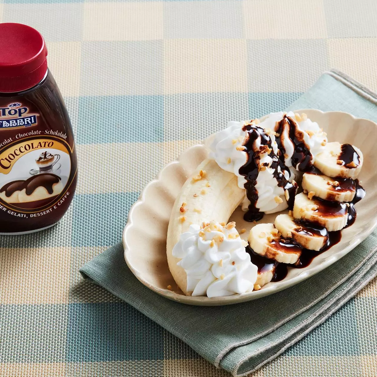 Banana com creme de leite e Topping de Chocolate